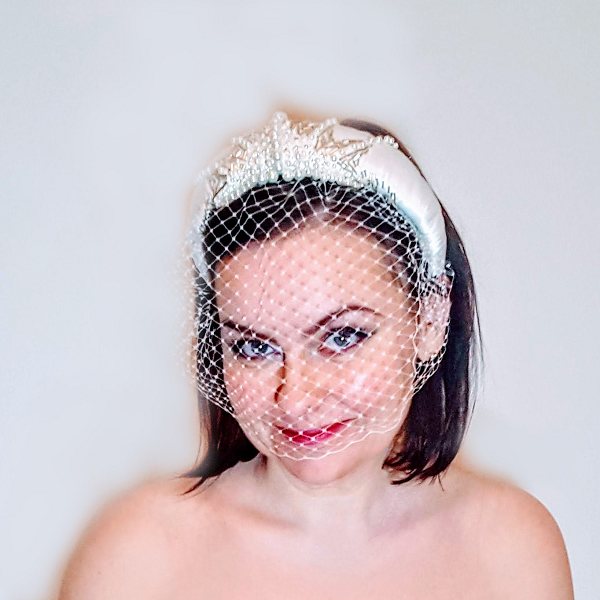Bridal satin and beaded Headband model looking forward and smiling