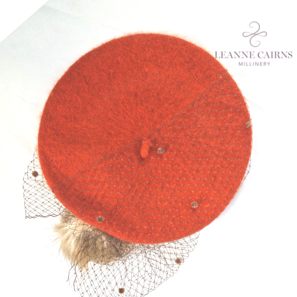Burnt Orange Round Wool French Beret style hat flat top view