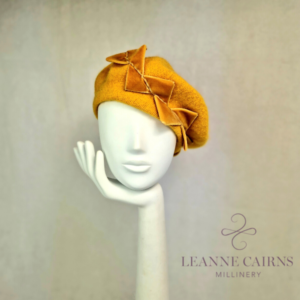 Mustard Yellow Wool French Beret and velvet ribbon detailed style hat on mannequin , front view/ right / left side view